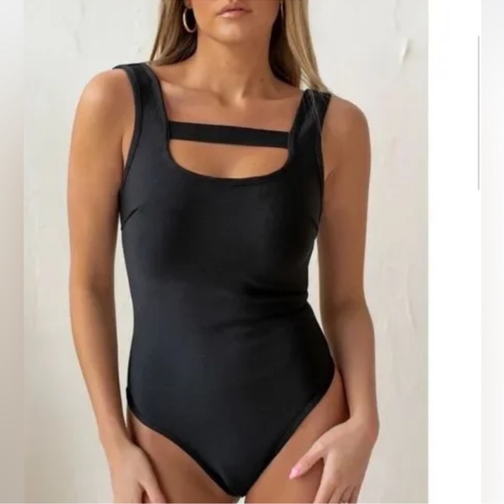 By Egreis Black Cutout Bodysuit size Large. Nwt